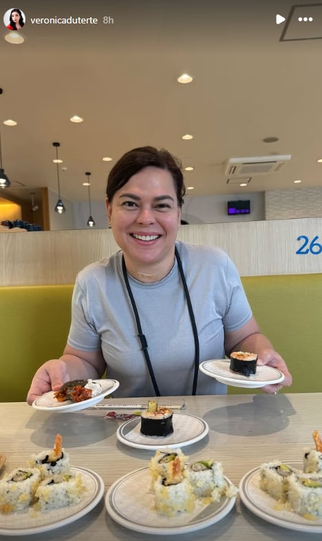 Vice President Sara Duterte enjoying her rice roll meal