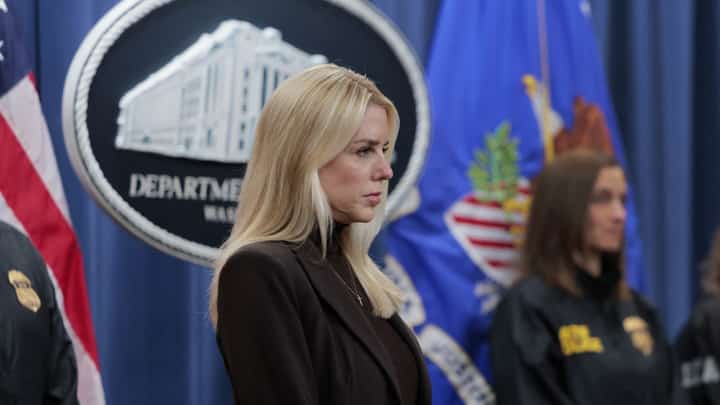 U.S. Attorney General Pam Bondi listens during a news conference at the Department of Justice Building on 12 February 2025 in Washington, DC. Bondi held the news conference to announce charges against the state of New York for failure to enforce federal immigration laws.