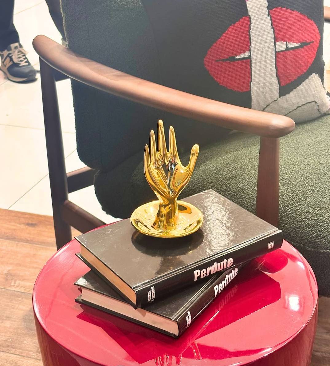 Brass hand ring holder.