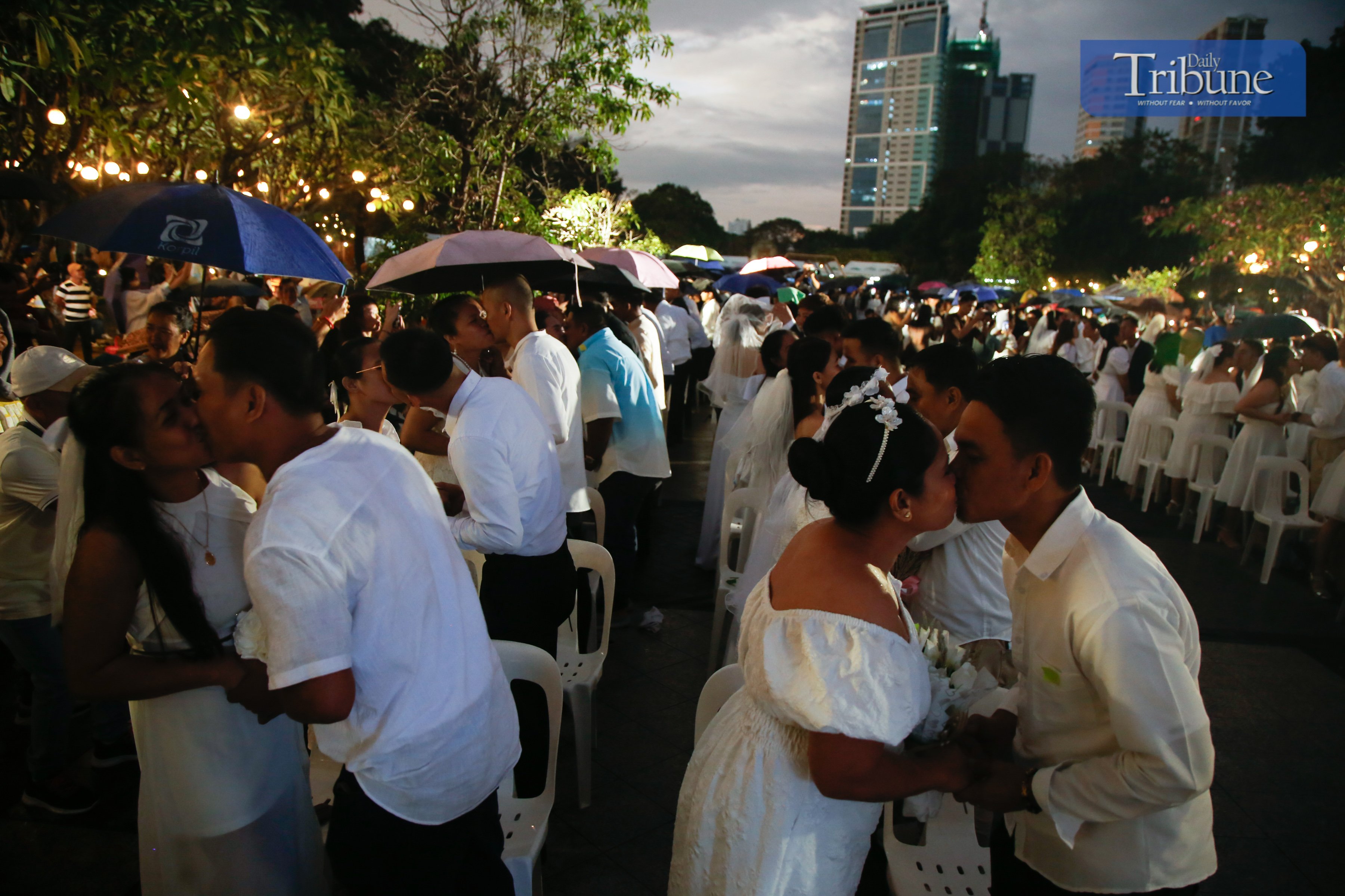 116 couples wed in Fort Santiago's "Kasalang Bayan" amid rain