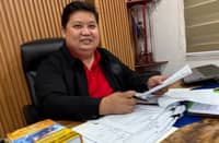 District Collector Atty. Kriden Balgomera of the Port of Limay, Bataan, presents the Warrant of Seizure and Detention to the DAILY TRIBUNE.