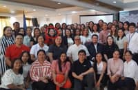 Charie Sweet Dablio (circled) with other graduates of the Elevate Aida program.