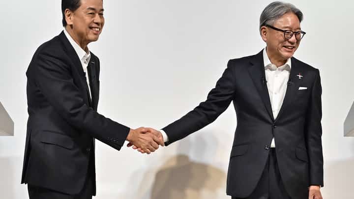NISSAN and Honda end merger talks. Shown are: Makoto Uchida, president and CEO of Japanese auto maker Nissan, and Toshihiro Mibe, director, president and representative executive officer of auto maker Honda.