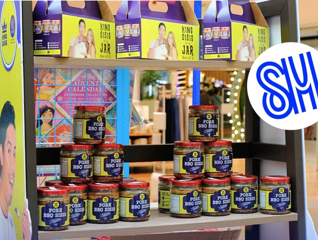 A variety of delicious food products, like bottled Pork Sisig Barbecue, are available at the Viyline Micro, Small, and Medium Enterprises (MSME) Caravan, which travels to SM Supermalls nationwide.