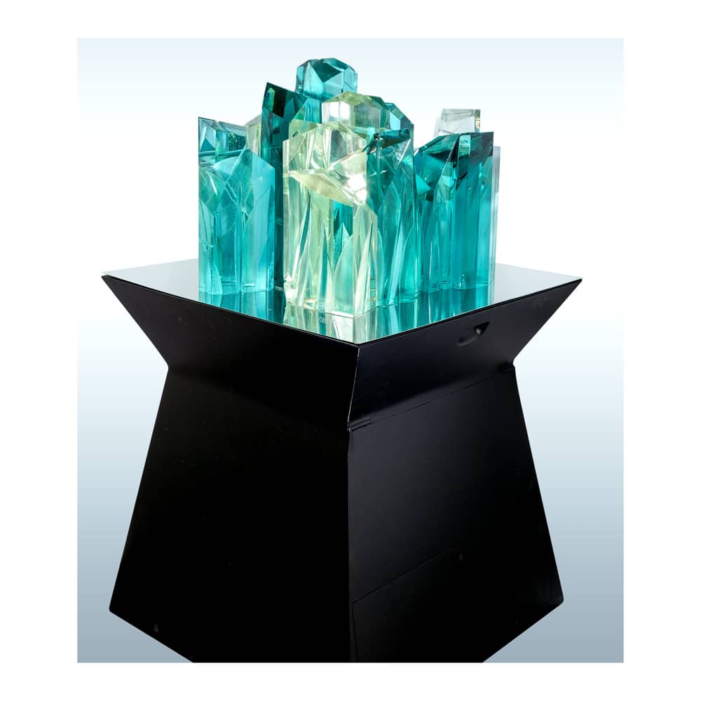 Ramon Orlina (b. 1944) ‘Family United,’ signed and dated 2020, carved peridot glass, 17” x 20 3/4” x 20 1/2” (43 cm x 53 cm x 52 cm).