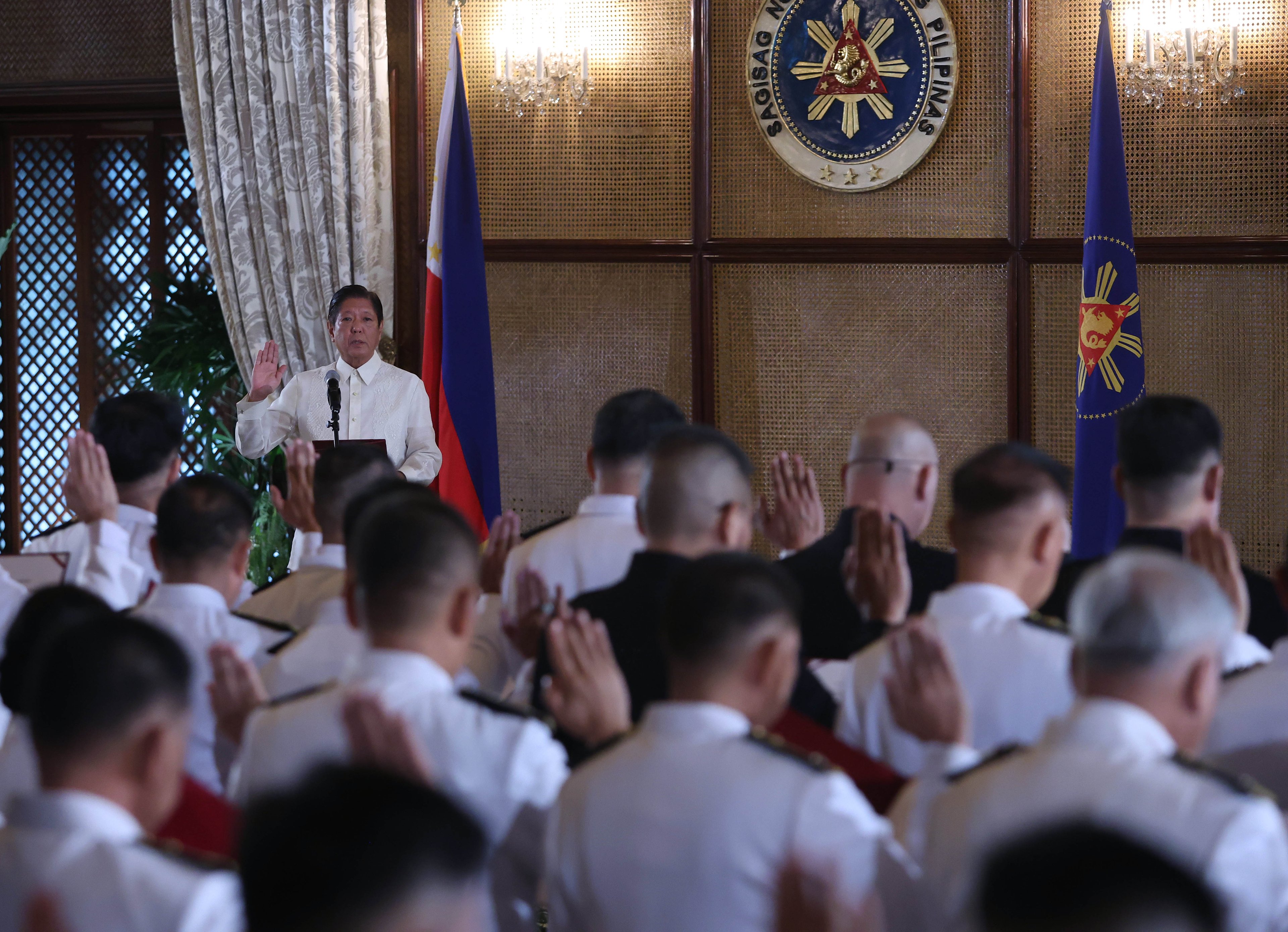 Marcos hails generals, flag officers