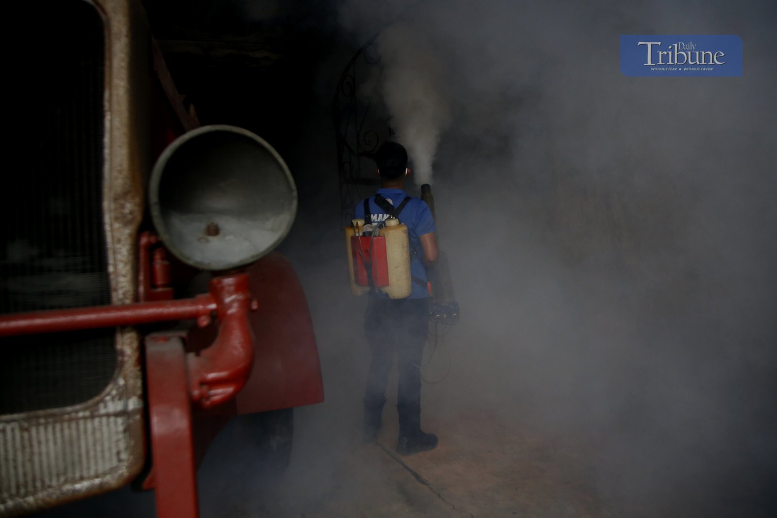 Manila City's Disaster Risk Reduction Office conducts fogging operations in Barangay 390 on 20 February 2025 as dengue cases rise, with Quezon City declaring an outbreak.