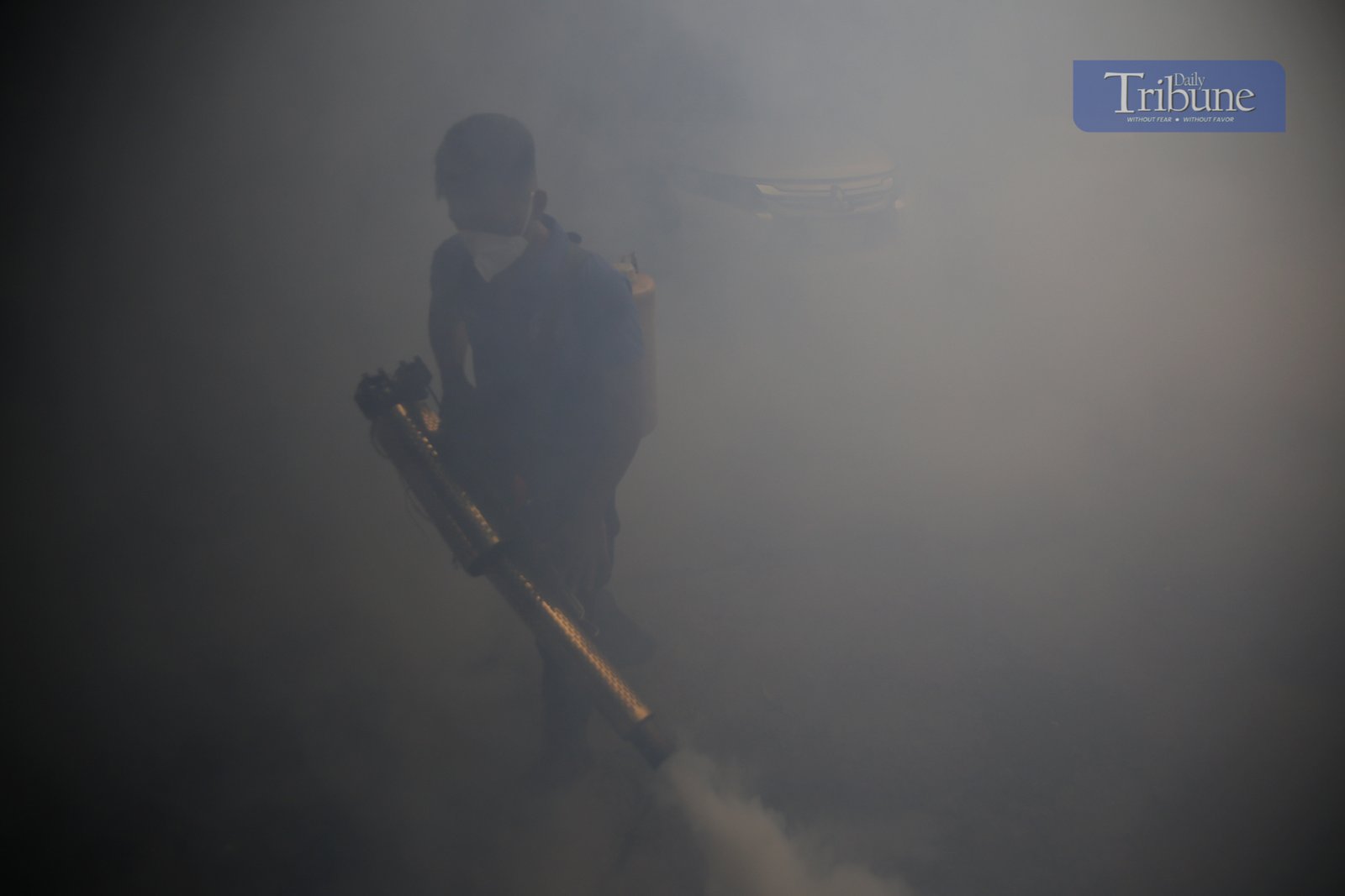 Manila City's Disaster Risk Reduction Office conducts fogging operations in Barangay 390 on 20 February 2025 as dengue cases rise, with Quezon City declaring an outbreak.