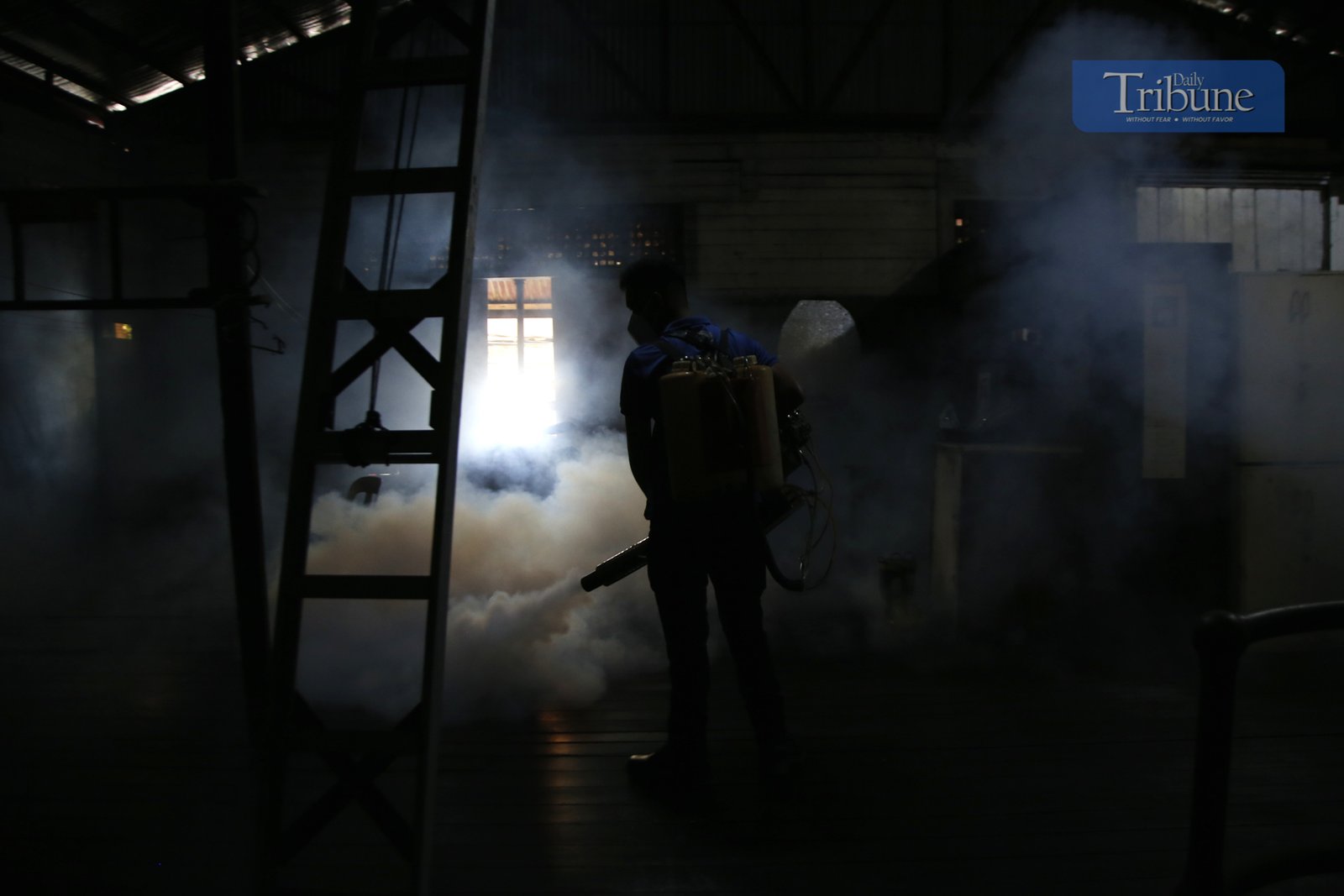 Manila City's Disaster Risk Reduction Office conducts fogging operations in Barangay 390 on 20 February 2025 as dengue cases rise, with Quezon City declaring an outbreak.