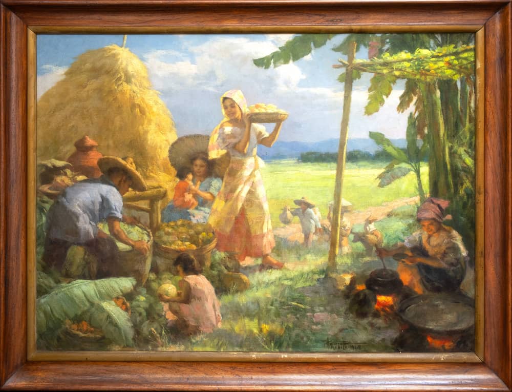 Fernando Amorsolo (1892-1972) ‘Harvest,’ signed and dated 1948 (lower right), oil on canvas, 24” x 33” (61 cm x 84 cm).