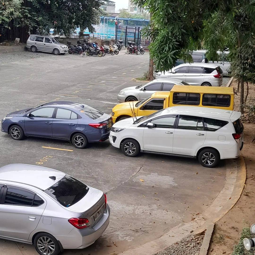 Dad trying to block my car with his. We both have Toyotas. We love to kid ourselves in our home.