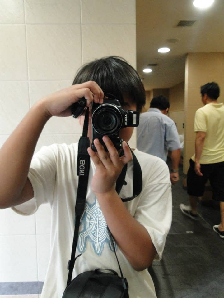 Grew up a bit but still a Japanese product hangs on my neck. This time it's a Sony camera.