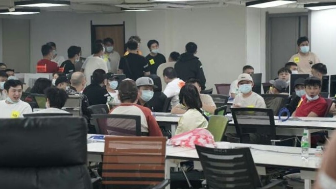 More than 450 arrested in 'Chinese-run' scam center raid