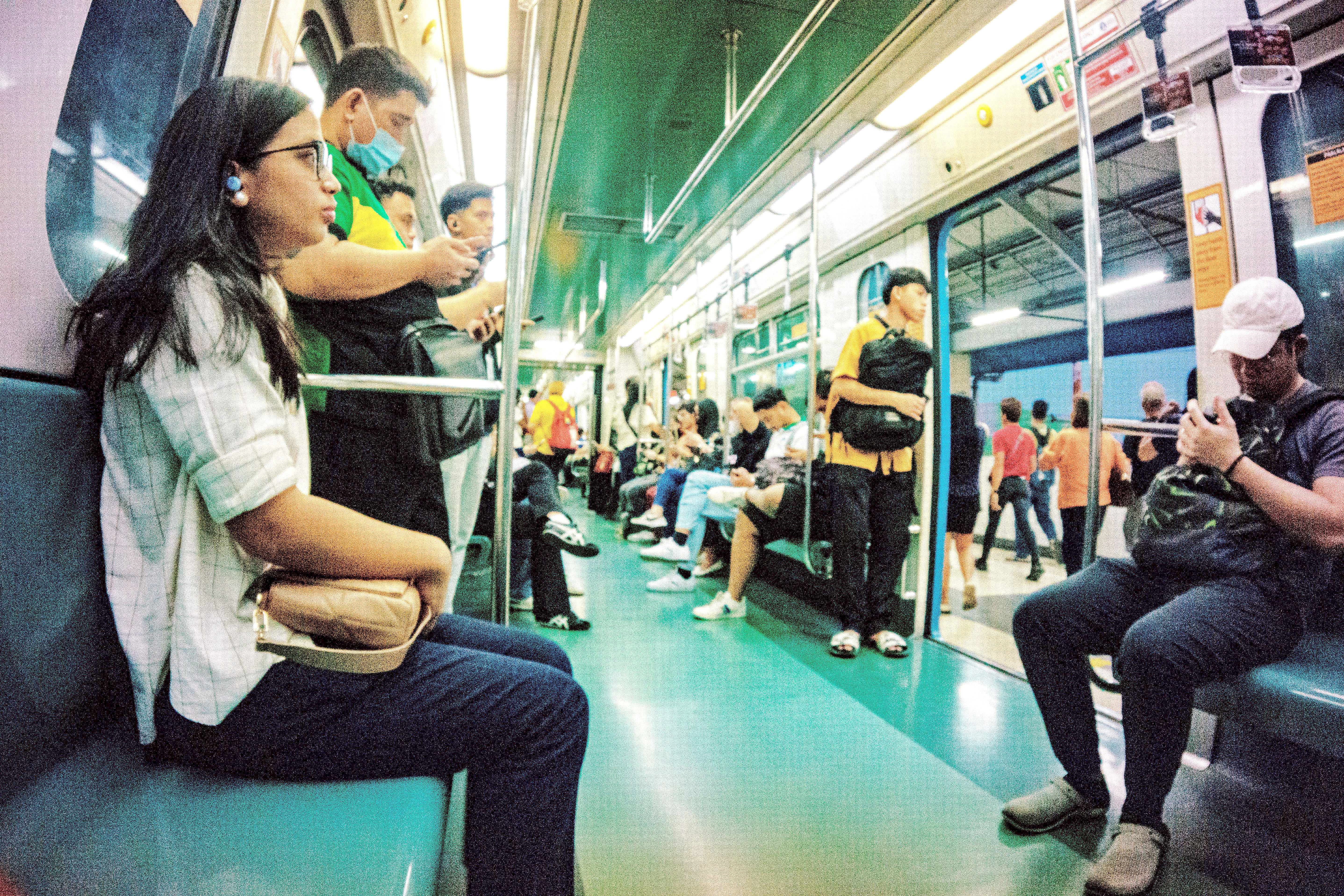 PASSENGERS disembark from the Light Rail Transit Line 1 as it comes to a stop at one of its stations. The longest-running metro railway in the country is set to raise its fare starting 2 April under the newly approved fare matrix, leaving commuters bracing for the impact of the upcoming change.