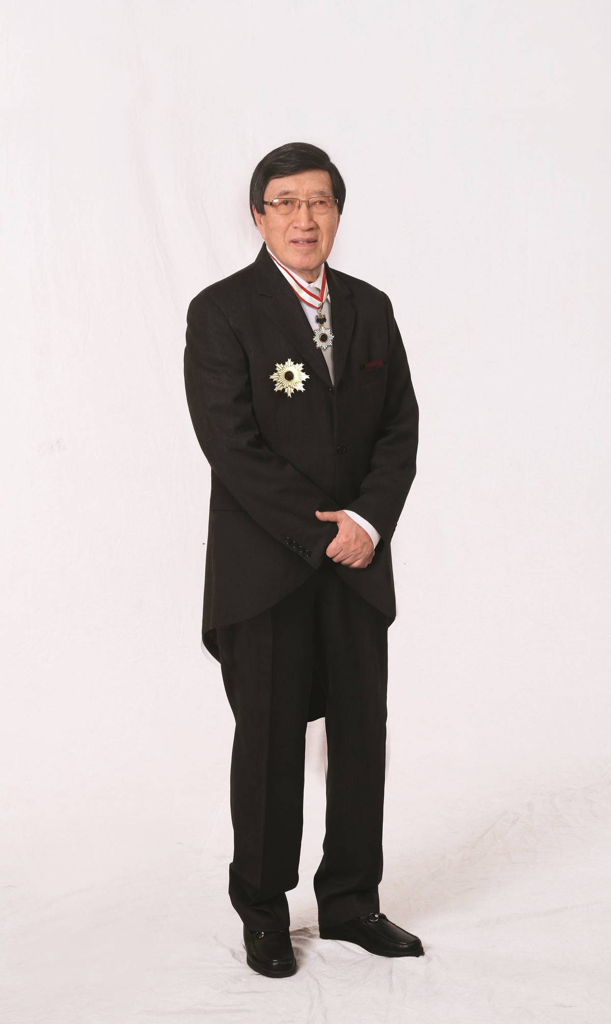 The late Dr. George S.K. Ty, wearing his Gold and Silver Star medals from Japan.