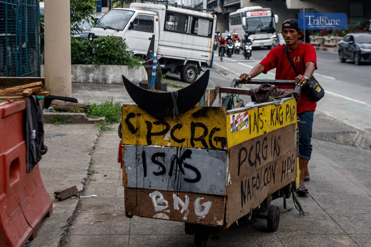 Kuya Rolando returns with his plastic treasures.
