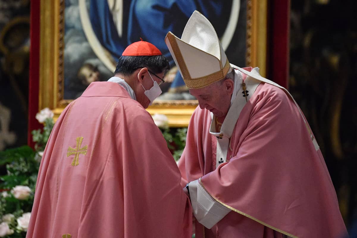 Pope Francis (R) thanks Philippine Cardinal Luis Antonio Tagle after he addressed a message during a mass to mark 500 years of Christianity in the Philippines, on 14 March 2021 at St. Peter's Basilica in The Vatican.