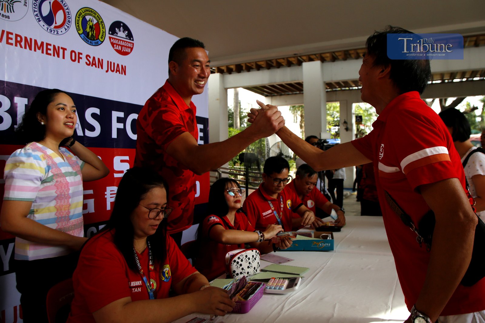 The local government of San Juan City sells NFA rice at the city hall driveway on 24 February 2025. A 50-kilo sack is priced at P1,650 as part of the Department of Agriculture's Food Security Emergency.