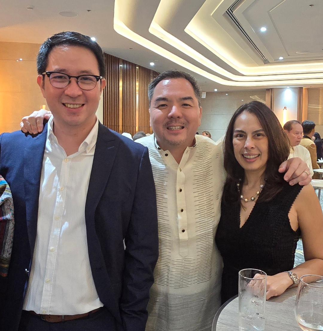 Kenneth Huan with Snyder and Jennifer Su.