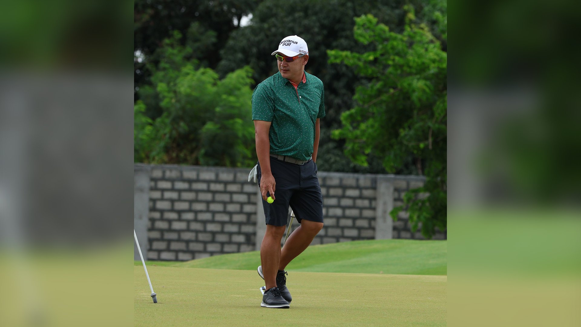 RIDING THE WIND: Que survives windy Pinatubo, preserves 3-shot lead