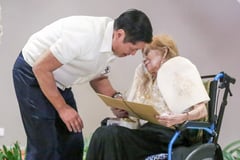Marcos gives elderly cash gifts 