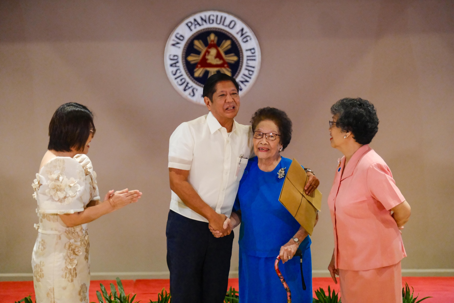 Marcos distributes cash gifts to seniors under Centenarians Act