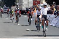 Jazmine Kaye Vinoya raises her hands to signal her victory in the Women Junior road race of the PhilCycling National Championships for Road on Wednesday.