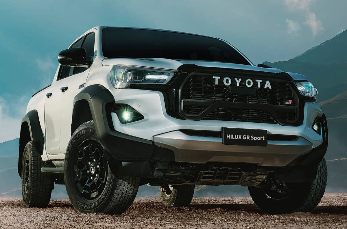 The Toyota Hilux conquers rough roads and heavy loads with ease.