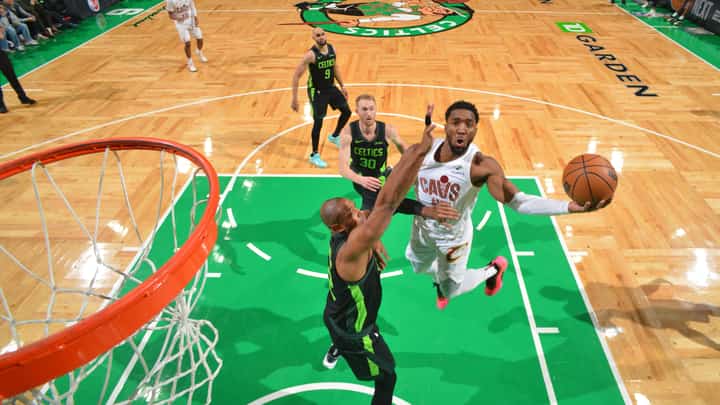 Donovan Mitchell drives his way to 41 points to lead the Cleveland Cavaliers to a 123-116 win over the defending champion Boston Celtics Friday in their NBA regular season game.