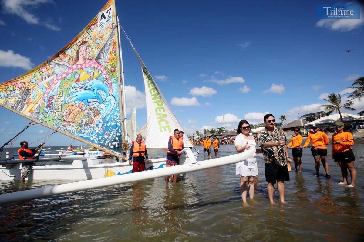 Iloilo City Mayor Jerry P. Treñas, alongside his daughter Raisa, led the opening of the 52nd Paraw Regatta Festival on 2 March 2025, as vibrant regatta boats set sail from Arevalo district to kick off the 30-kilometer race, celebrating the traditional double-outrigger boats and their significance in Ilonggo maritime heritage