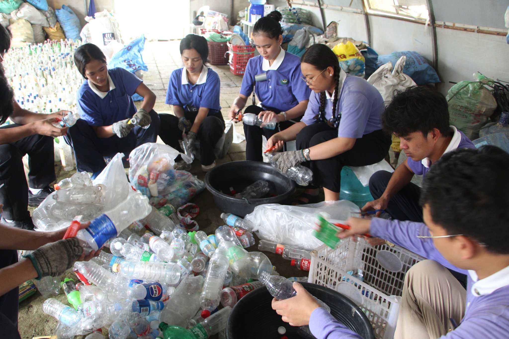 Bottle recycling, Okada’s green thrust