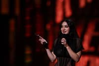 British singer Charli XCX celebrates on stage after receiving the award for Song of the year during the BRIT Awards 2025 in London on 1 March 2025.