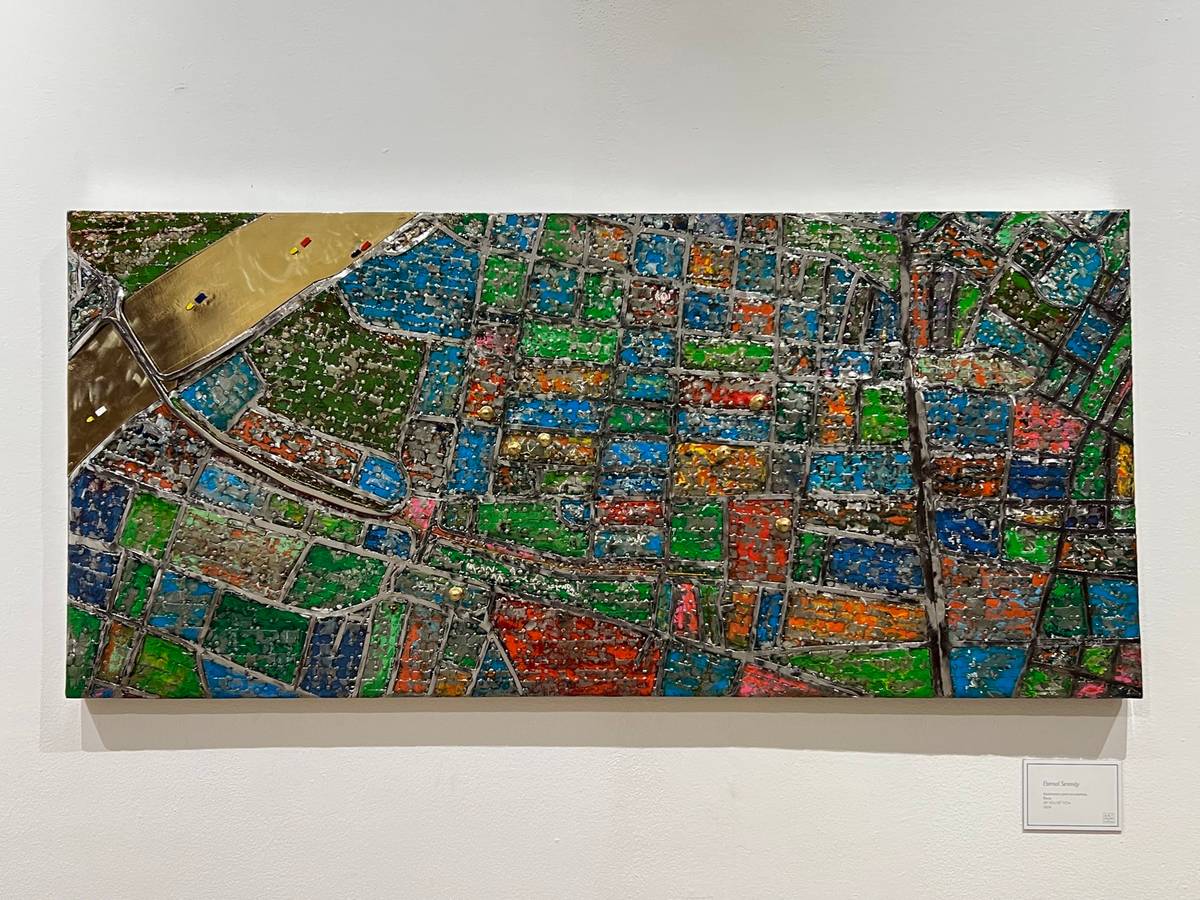 ‘Eternal Serenity,’ automotive paint on stainless, brass 24 1/2 x 53 1/2 inches 2024.