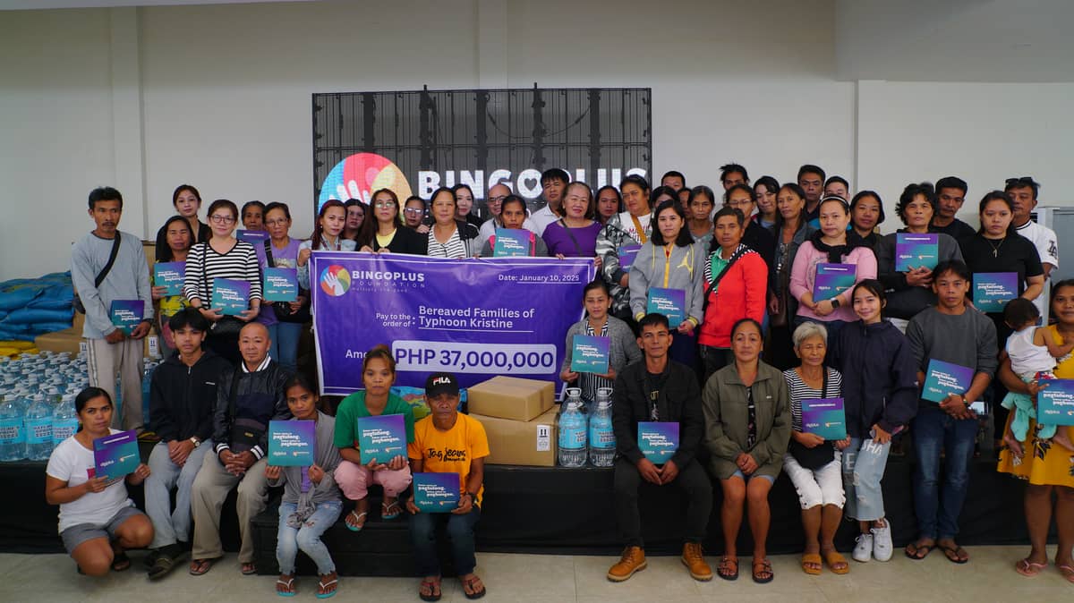 DSWD Assistant Secretary Paul Ledesma and DSWD Regional Director Norman Laurio join BingoPlus Foundation Executive Director Angela Camins-Wieneke in a turnover ceremony in Pili, Camarines Sur.