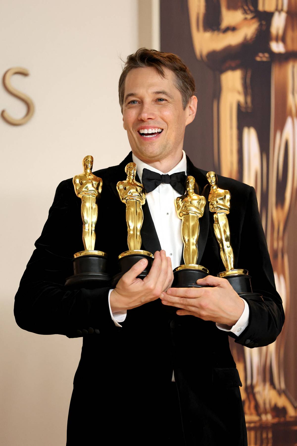 HOLLYWOOD, CALIFORNIA - MARCH 02: Sean Baker, winner of the Best Picture, Best Directing, Best Film Editing, and Best Original Screenplay for “Anora”, poses in the press room during the 97th Annual Oscars at Ovation Hollywood on March 02, 2025 in Hollywood, California.