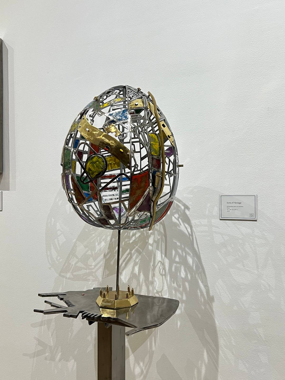 ‘Icons of Heritage,’ automotive paint on stainless, brass 15 x 28 1/2 x19 inches 2024.