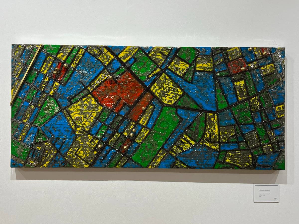 ‘Pillars of Harmony,’ automotive paint 
on stainless, brass 24 x 53 3/8 inches 2024.
