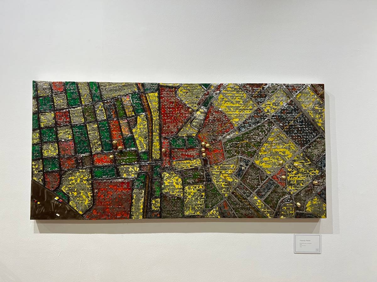 ‘Heavenly Abodes,’ automotive paint on stainless, 
brass 24 3/4 x 53 inches 2024.