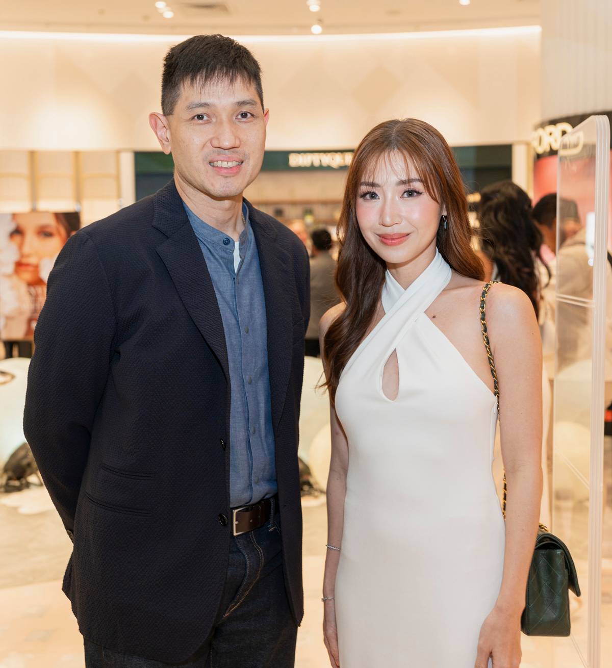 Rustan’s senior vice president for Support and Development Michael Tantoco Huang and Kryz Uy.