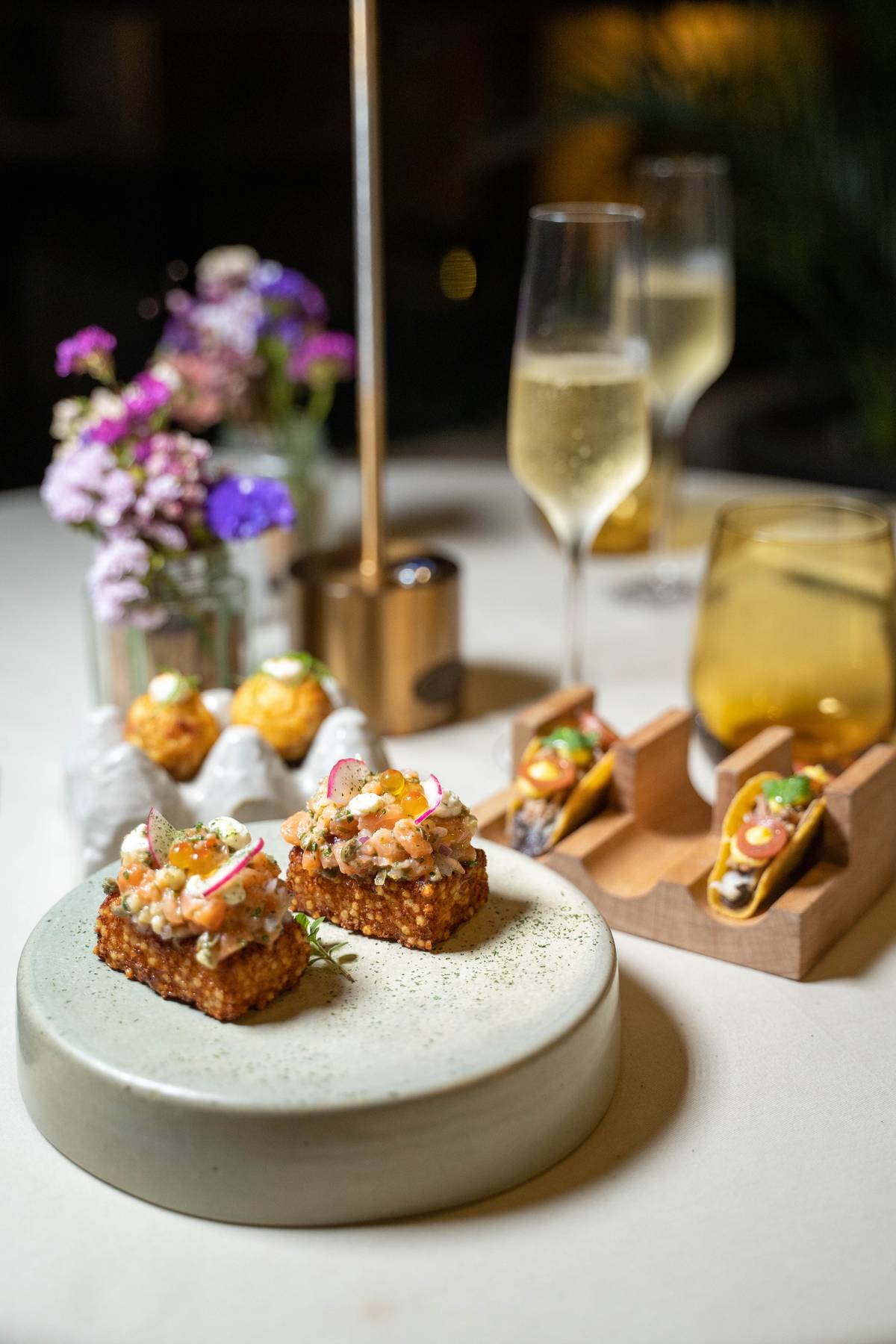 Samira Bites Salmon and Tapioca Crackers, Bulalo Crispy Tacos, Txistorra Takoyaki.