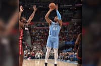Donovan Mitchell drops 26 points to lead the Cleveland Cavaliers to a 112-107 victory over the Miami Heat in the NBA regular season.