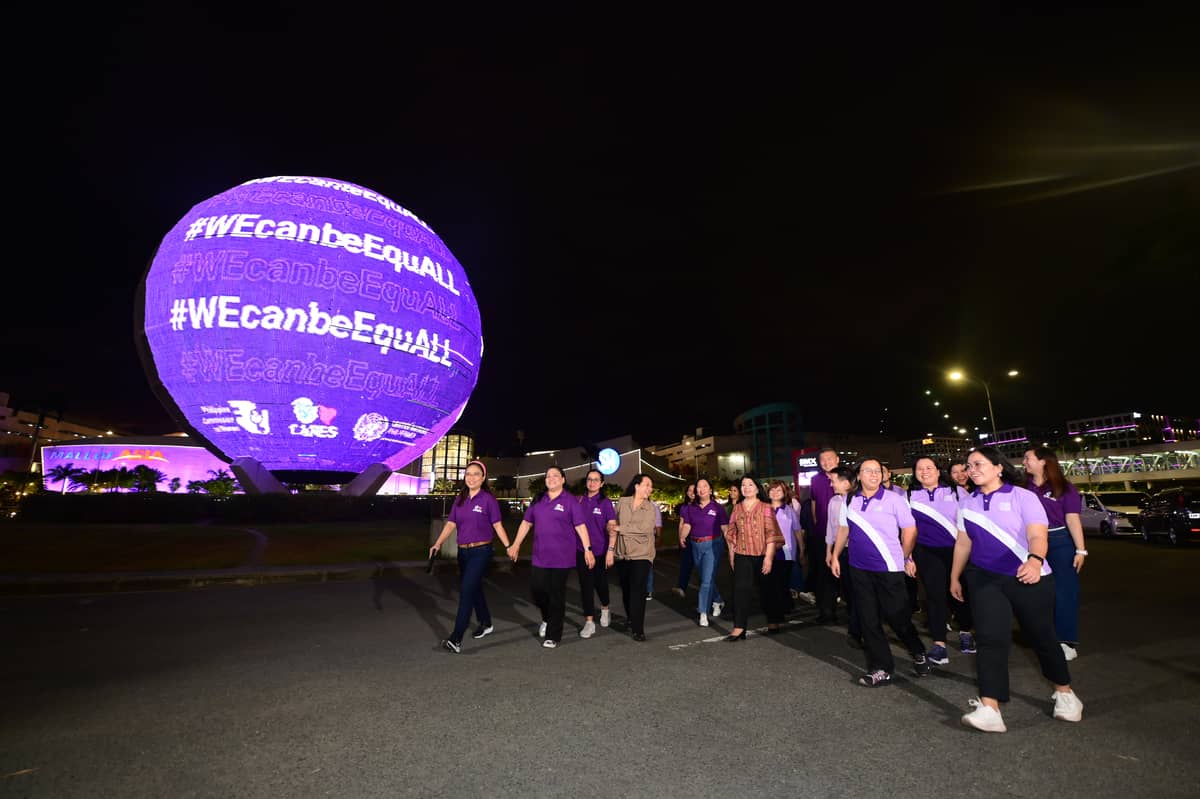 A beacon of change: Illuminated in purple, the SM Mall of Asia Globe stands as a powerful symbol of SM Cares' dedication to women's empowerment, marking the start of the 2025 National Women's Month in the Philippines.