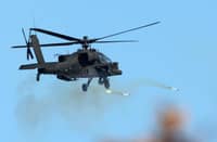 A South Korean Apache helicopter fires rockets during a joint live-fire drill between South Korea and the United States at the Seungjin Fire Training Field in Pocheon on 6 March 2025.
