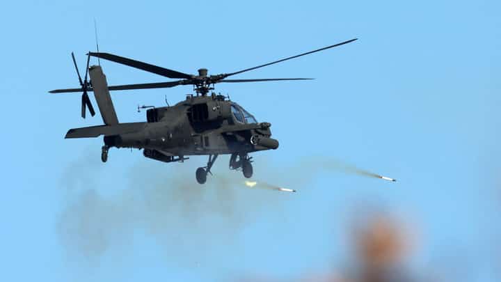 A South Korean Apache helicopter fires rockets during a joint live-fire drill between South Korea and the United States at the Seungjin Fire Training Field in Pocheon on 6 March 2025.
