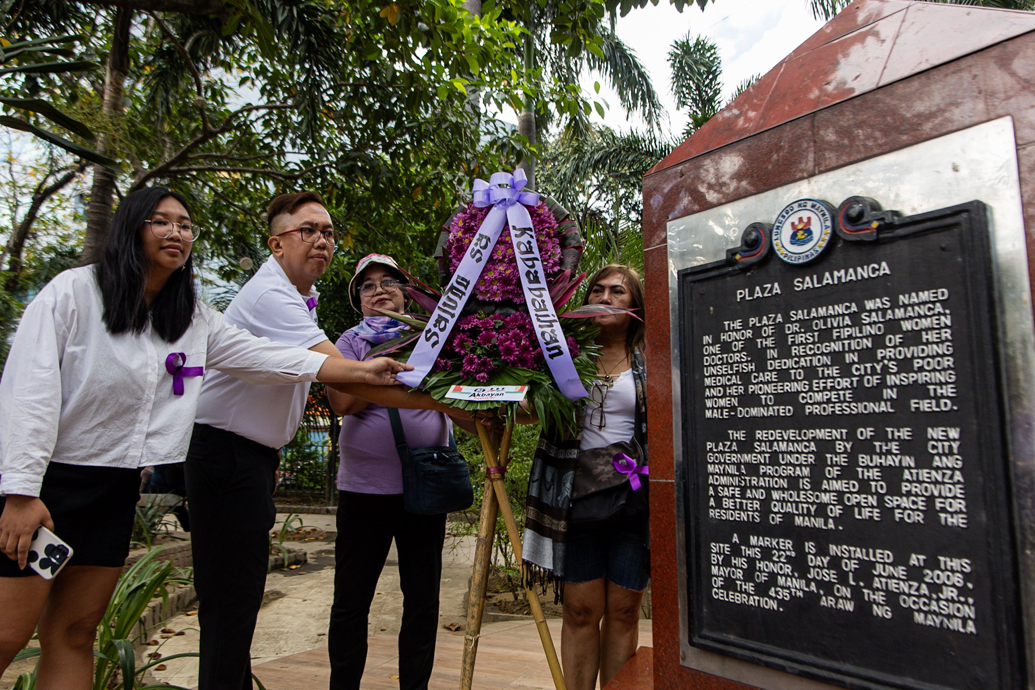 Akbayan Women holds a wreath-laying ceremony at Plaza Salamanca in Manila on 7 March 2025, to mark Women's Month and advocate for stronger laws to empower women.