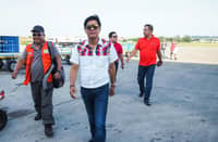 Then-vice presidential candidate Bongbong Marcos (BBM), followed by Rep. Martin Romualdez, arrives at Davao International Airport on 8 May 2016 to meet with then-Mayor Rodrigo Duterte and his daughter, then-Vice Mayor Sara Duterte.