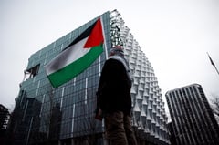 UK police close area around Big Ben as man with Palestinian flag scales tower