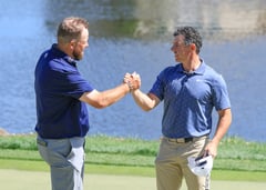 FUELED BY FRIENDSHIP: Lowry enjoys playing with McIlroy, posts 2-shot lead
