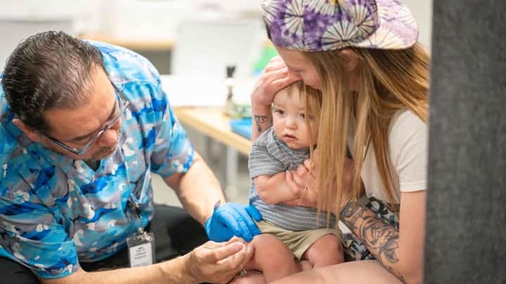 One-year-old River Jacobs getting his MMR vaccine in Texas.