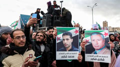 Syria president calls for unity after reports of mass killings